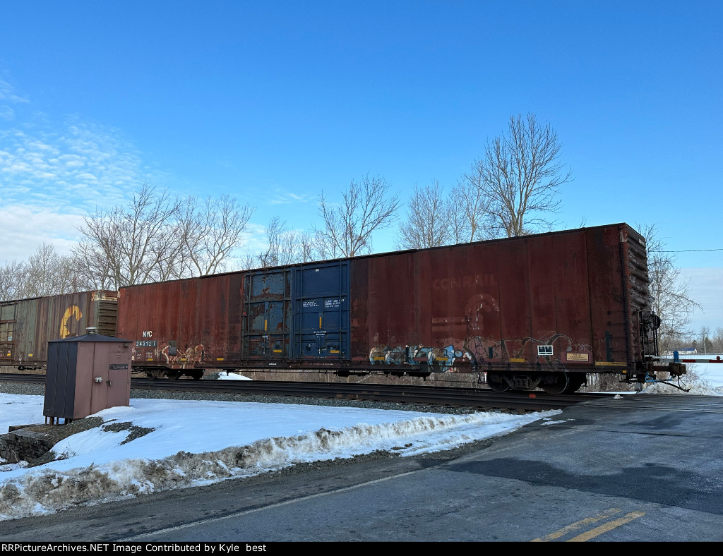 Giant rusty faded Conrail car 